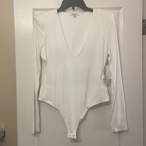 Cream / Ivory long sleeve Bodysuit Good American